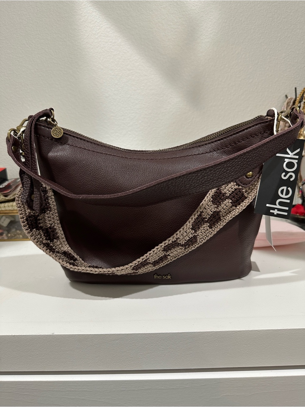 The Sak Arden Leather Hobo Bag in Plum with Woven Strap